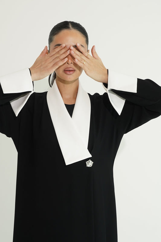 # The Timeless Elegance of Abayas: Quality, Tradition, and Empowerment in Qatari Fashion - Hissa Line