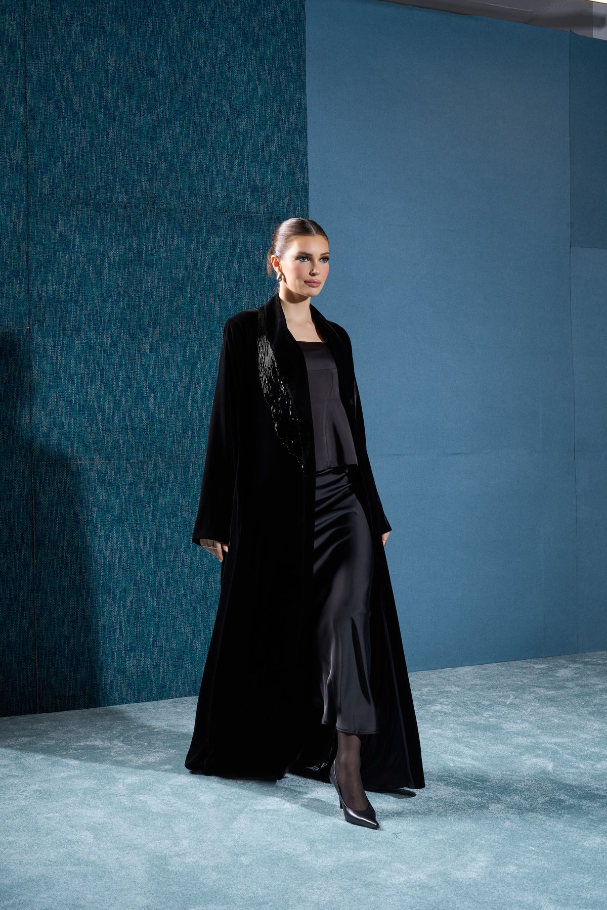 Hissa Line black velvet abaya in the original blue studio